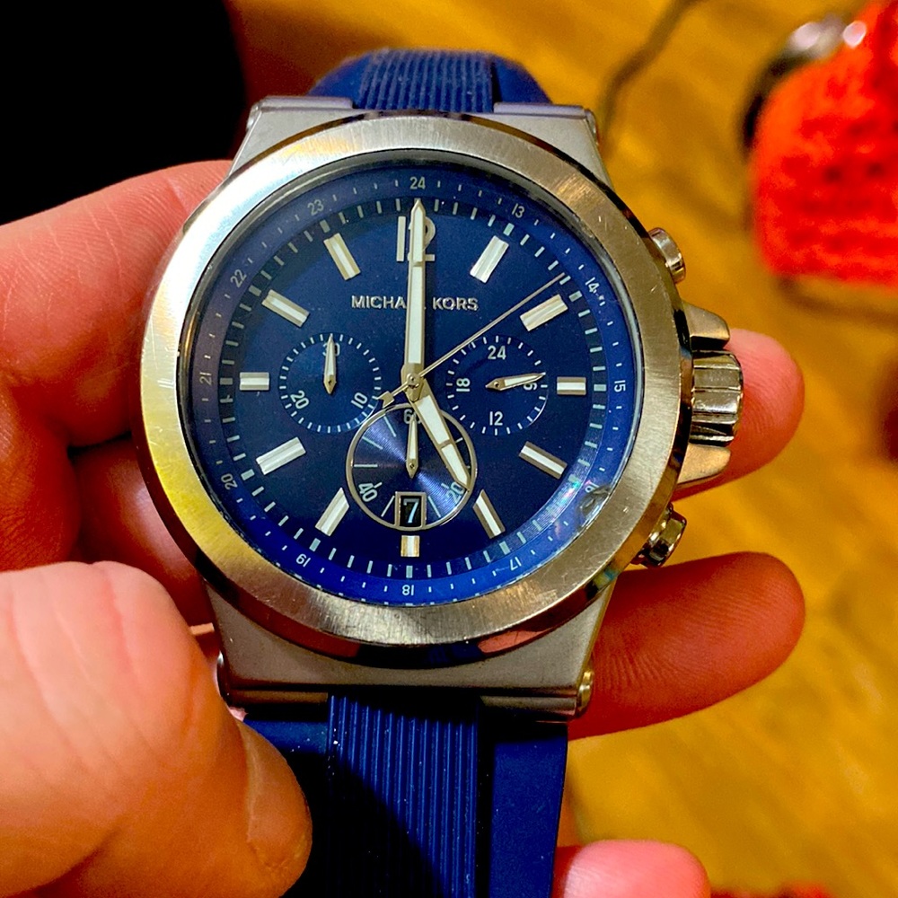Michael Kors MK 8383 Blue Face and Blue Rubber Band wrist. Super nice watch!